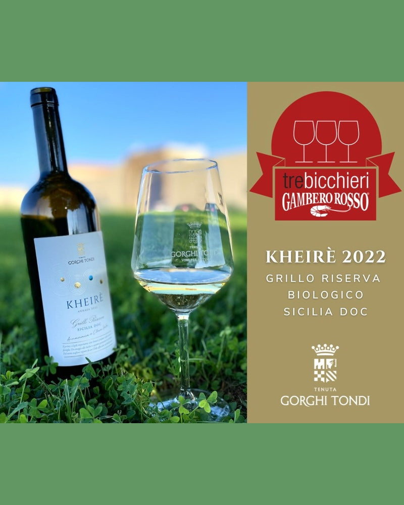 Gorghi Tondi Grillo KHEIRÈ Riserva 2022 DOC Sicilia white wine bottle with elegant label in a vineyard setting.